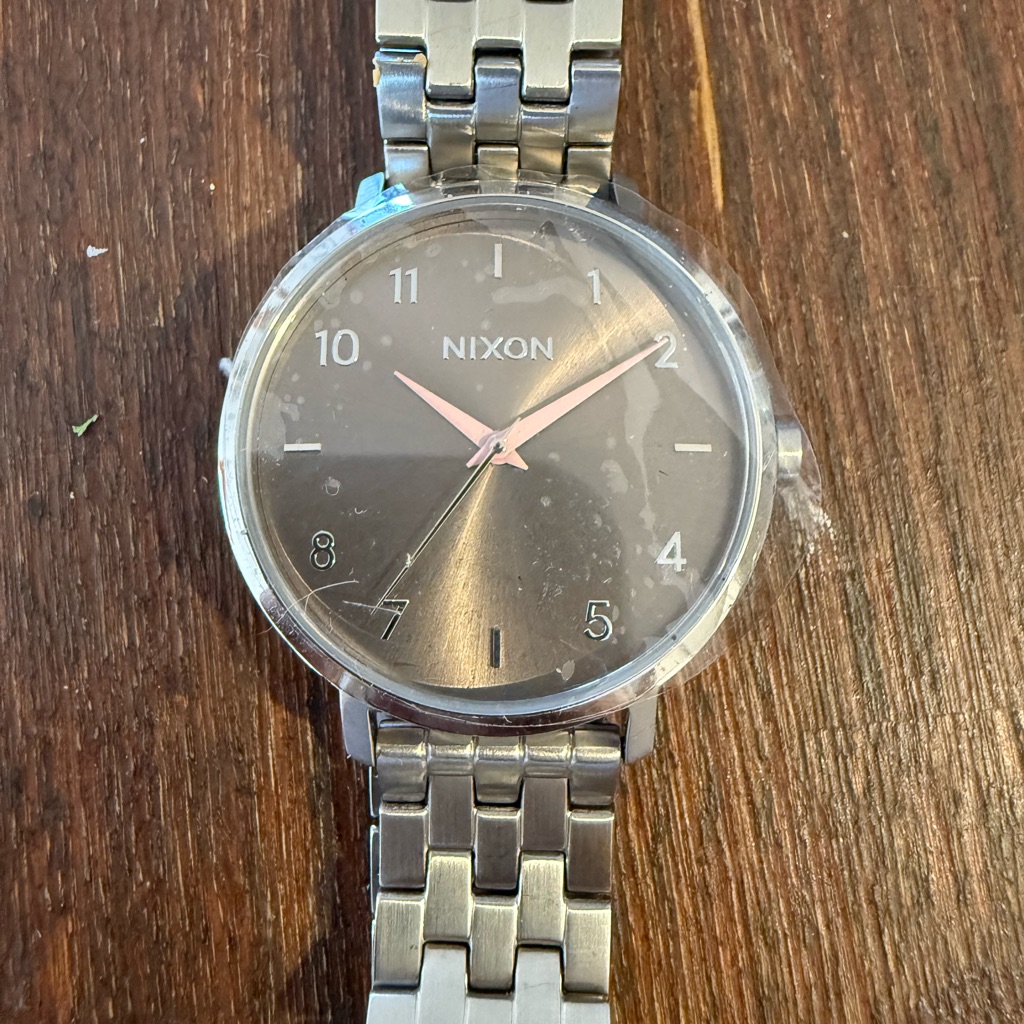Nixon Classic Silver And Gray Timepiece